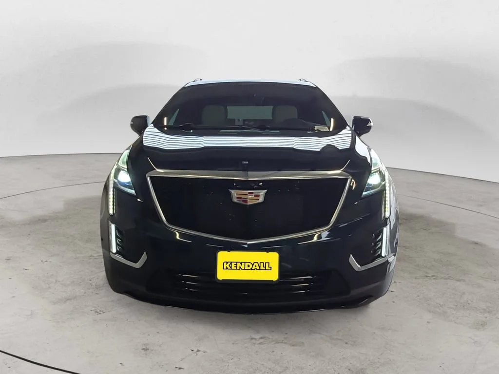 Used 2025 Emerald Lake Metallic Cadillac Sport image 2