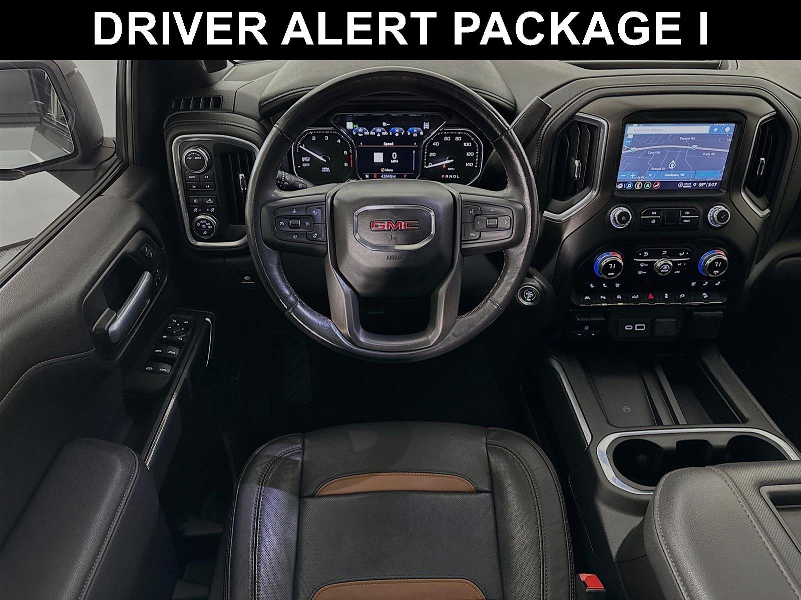 Used 2021 GMC Sierra 1500 AT4 with VIN 1GTU9EET6MZ253686 for sale in Winona, Minnesota