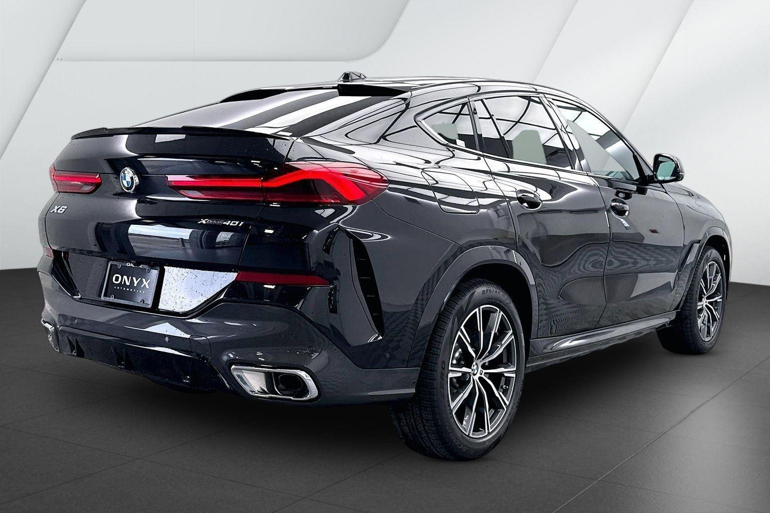 New 2026 Black Sapphire Metallic BMW xDrive40i image 3