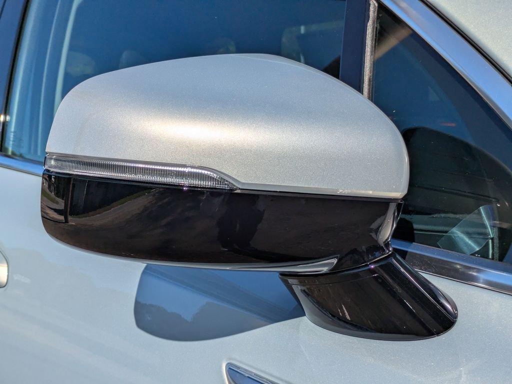 New 2026 Ivory Silver Kia LX image 11