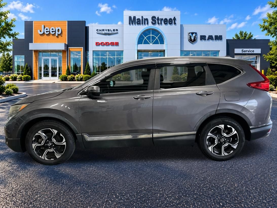 Used 2019 Honda CR-V Touring with VIN 7FARW1H92KE017017 for sale in Kansas City