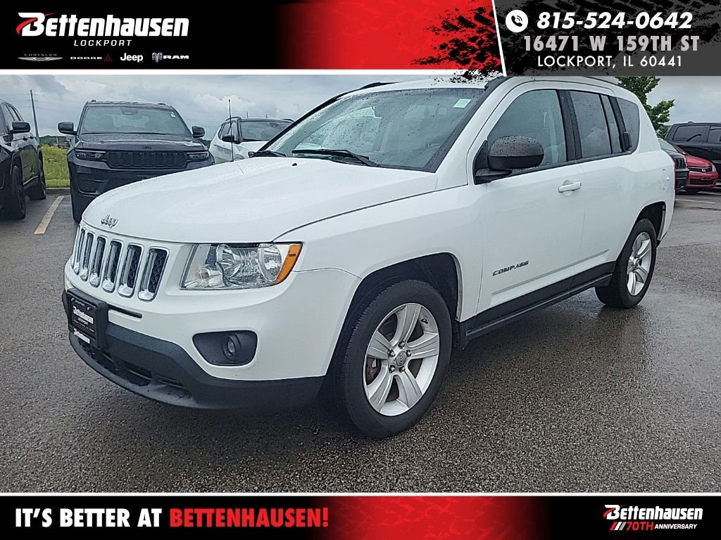 Used 2012 White Jeep Latitude image 1
