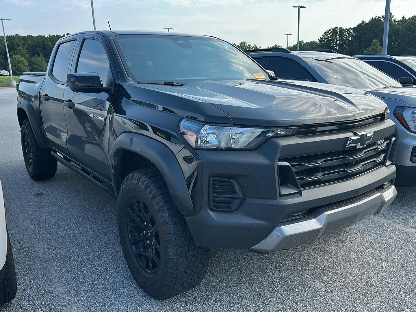 Used 2024 Black Chevrolet 4WD Trail Boss image 1