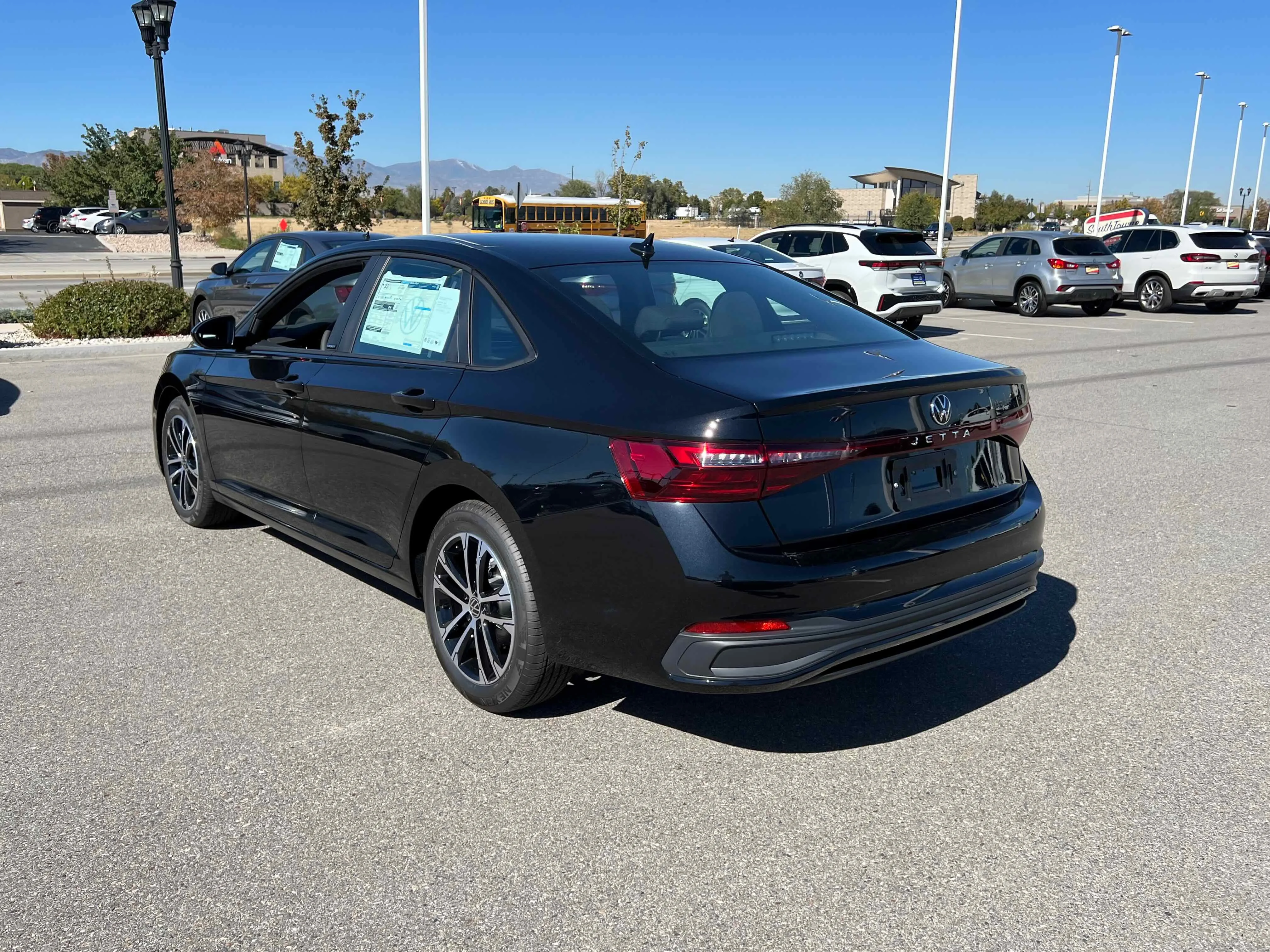 New 2026 Deep Black Volkswagen Sport image 11