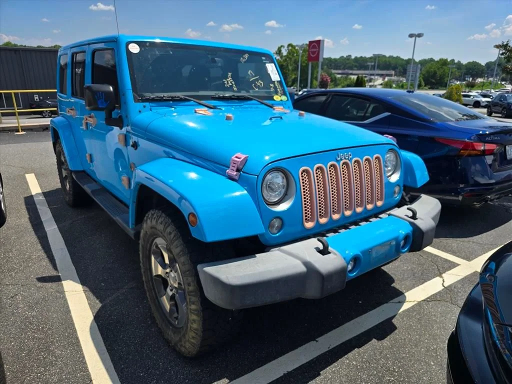 Used 2017 Blue Jeep Unlimited Sahara image 10