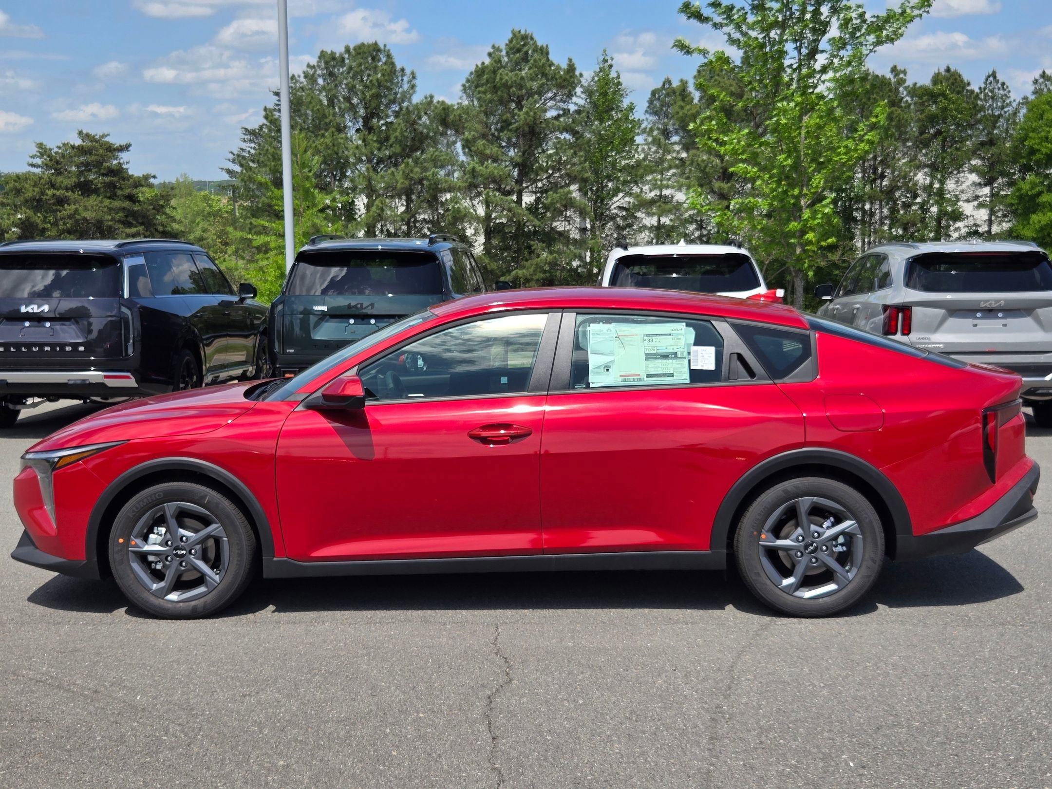 New 2026 Currant Red Kia LXS image 4