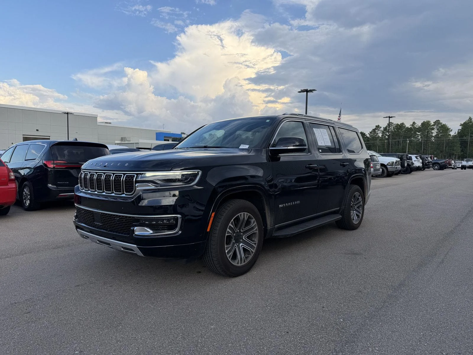 Used 2024 Diamond Black Crystal Pearlcoat Jeep Series II image 1