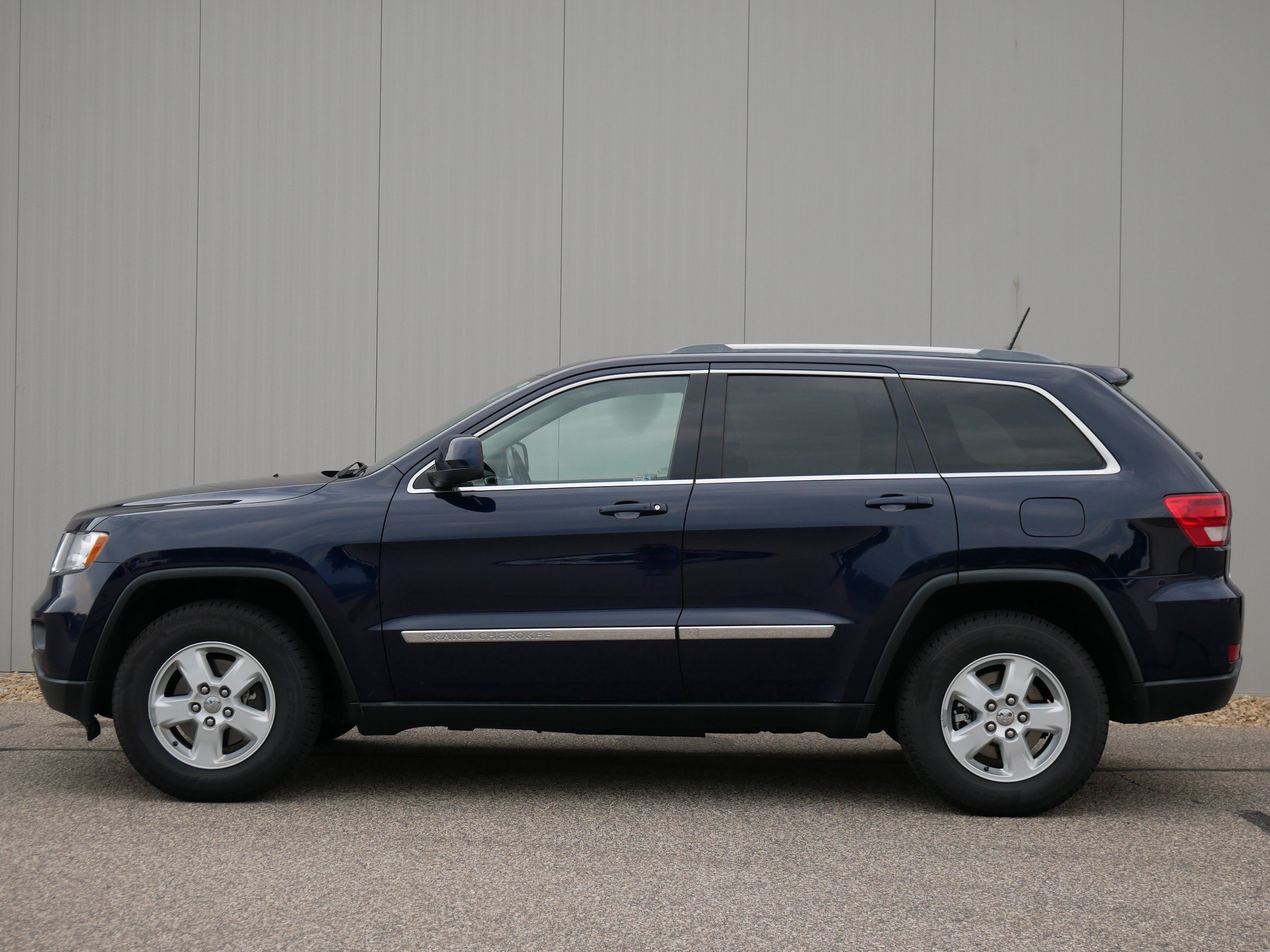 Used 2012 Jeep Grand Cherokee Laredo with VIN 1C4RJFAG5CC221261 for sale in Hastings, Minnesota