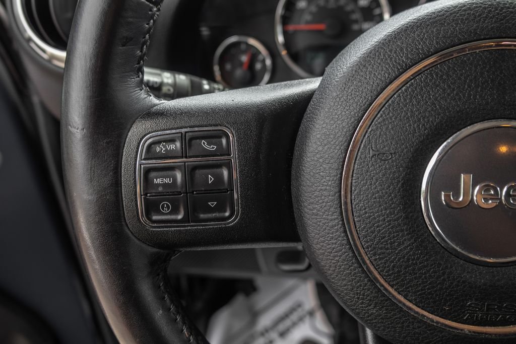 Used 2017 Black Jeep Unlimited Sahara image 23