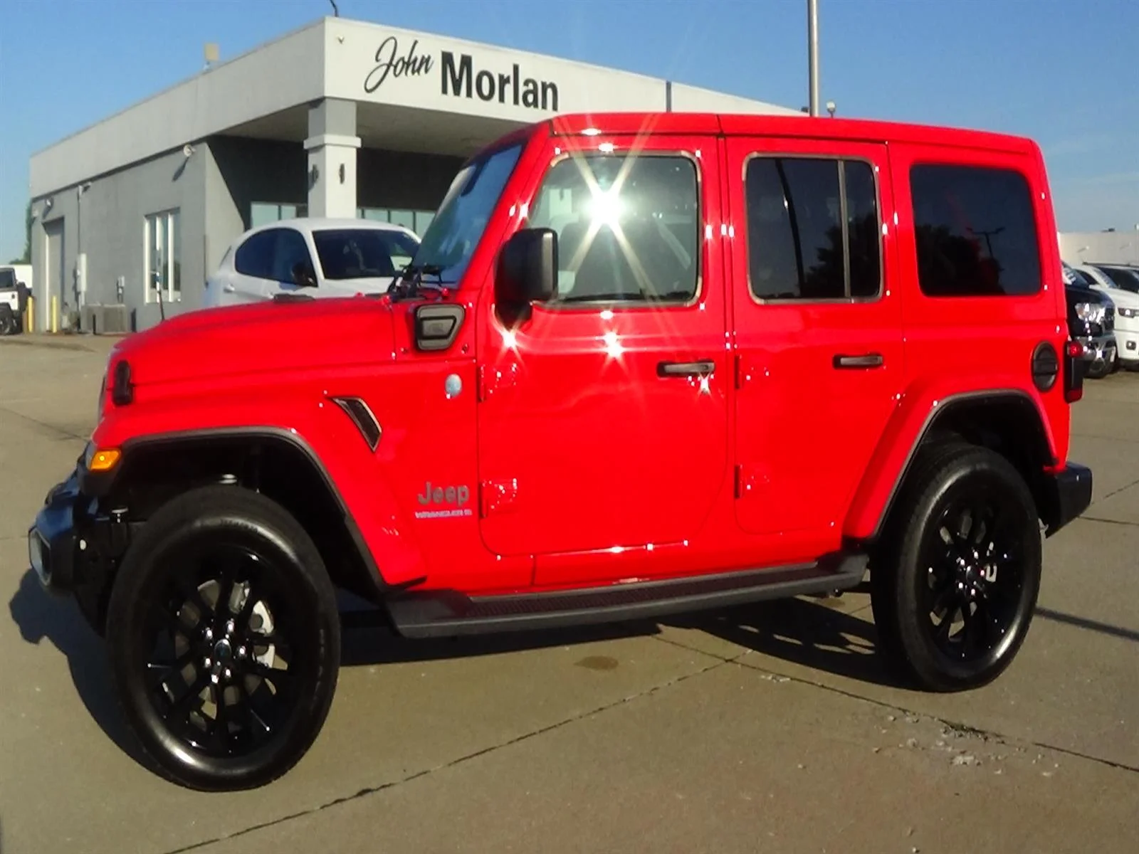 Used 2025 Firecracker Red Clear Coat (prc) Jeep Sahara 4xe image 1