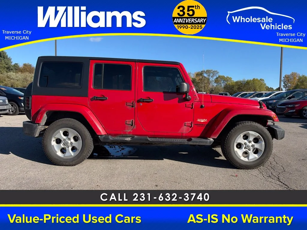 Used 2013 Flame Red Jeep Unlimited Sahara image 2
