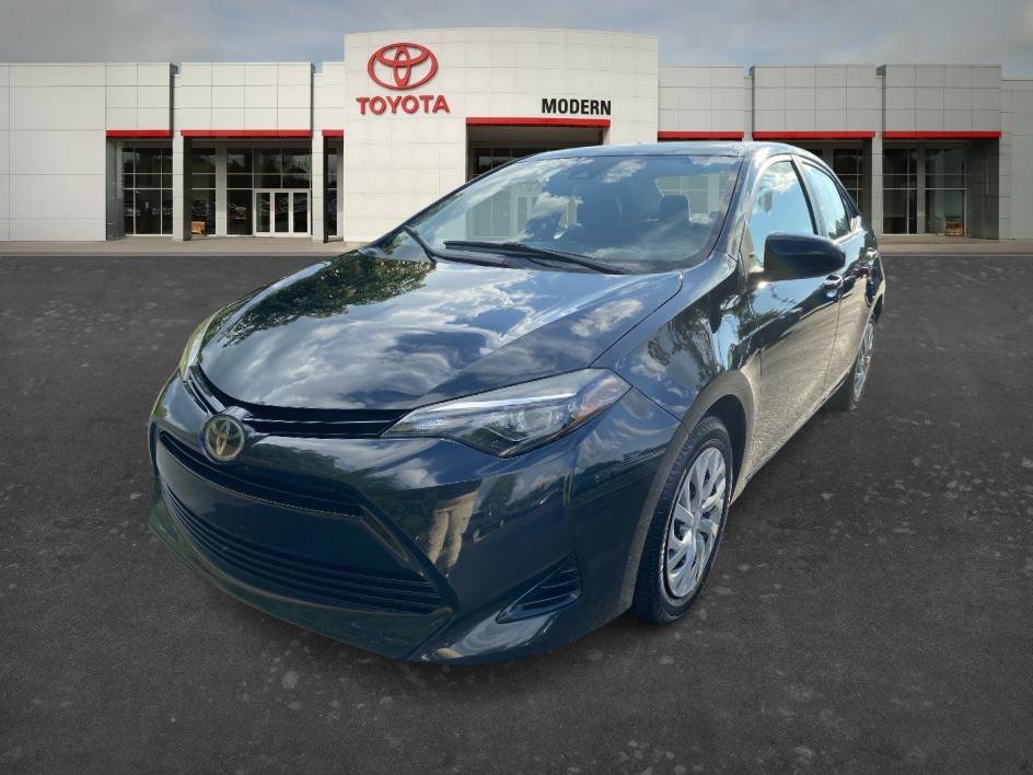 Used 2018 Black Sand Pearl Toyota LE image 1