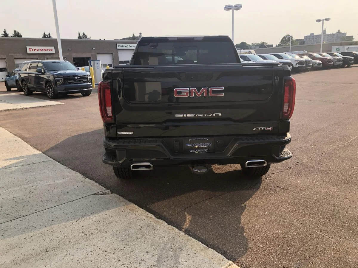 Used 2022 Black GMC 4WD Crew Cab 147" AT4 image 5