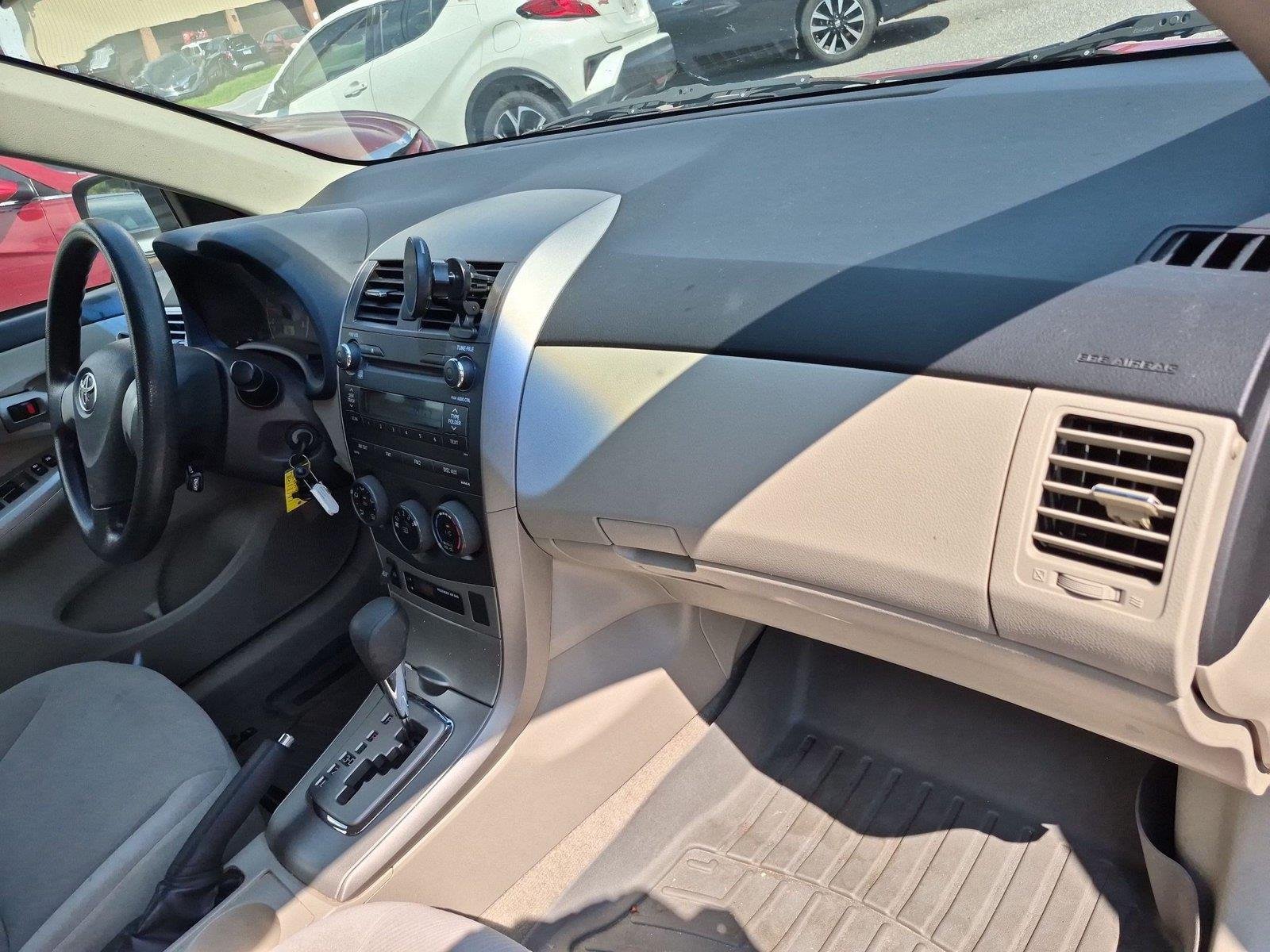 Used 2011 Barcelona Red Metallic Toyota LE image 32