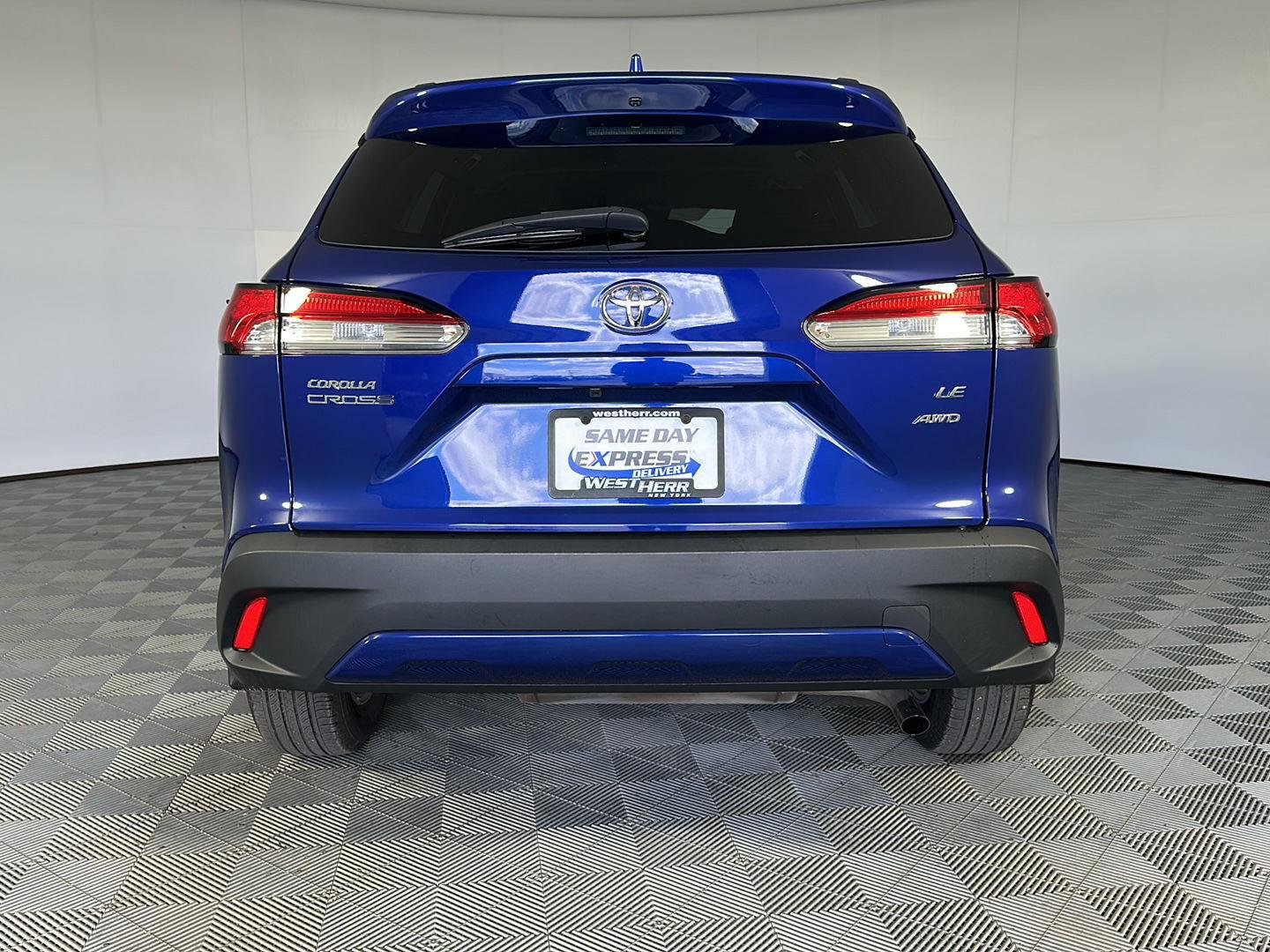 Certified Used 2024 Blue Crush Metallic Toyota LE image 6