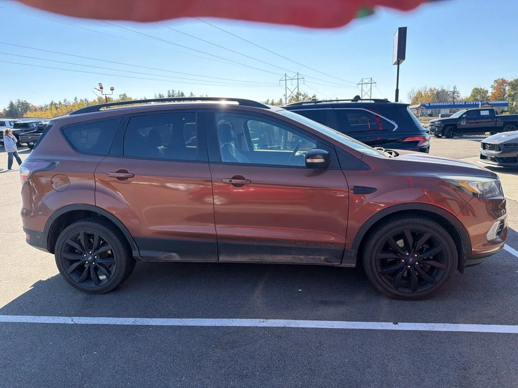 Used 2017 Red Ford Titanium image 1
