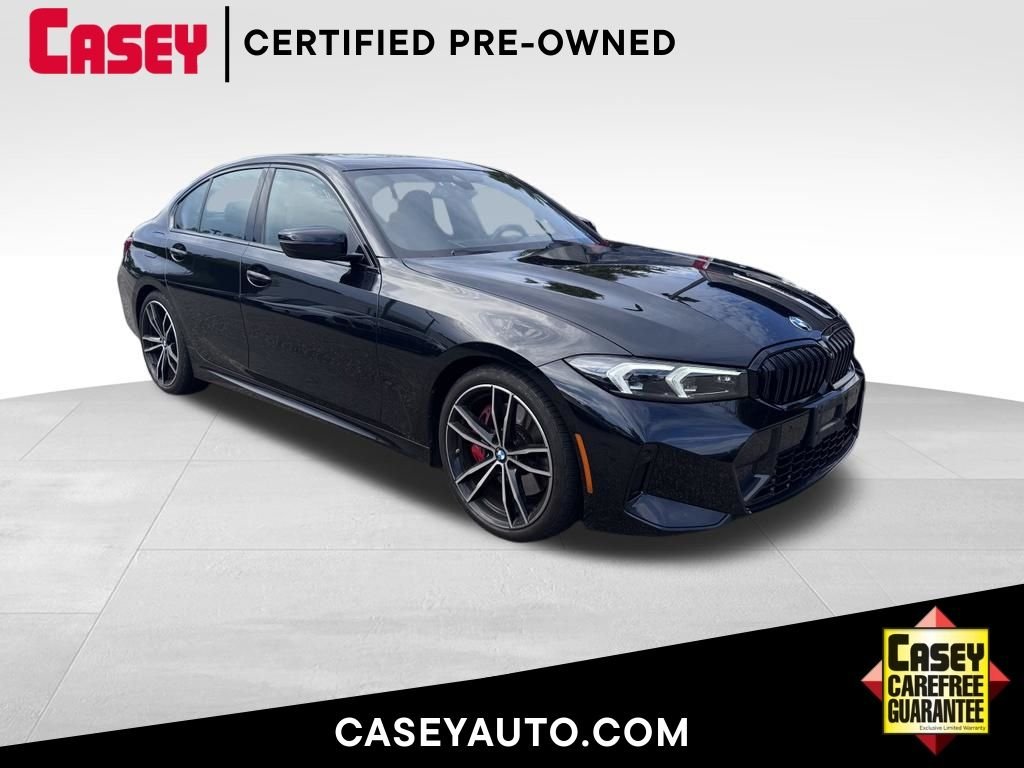 Certified Used 2024 Black Sapphire Metallic BMW 330i image 1