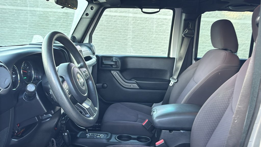 Used 2013 Billet Clearcoat Metallic Jeep Unlimited Sport image 18