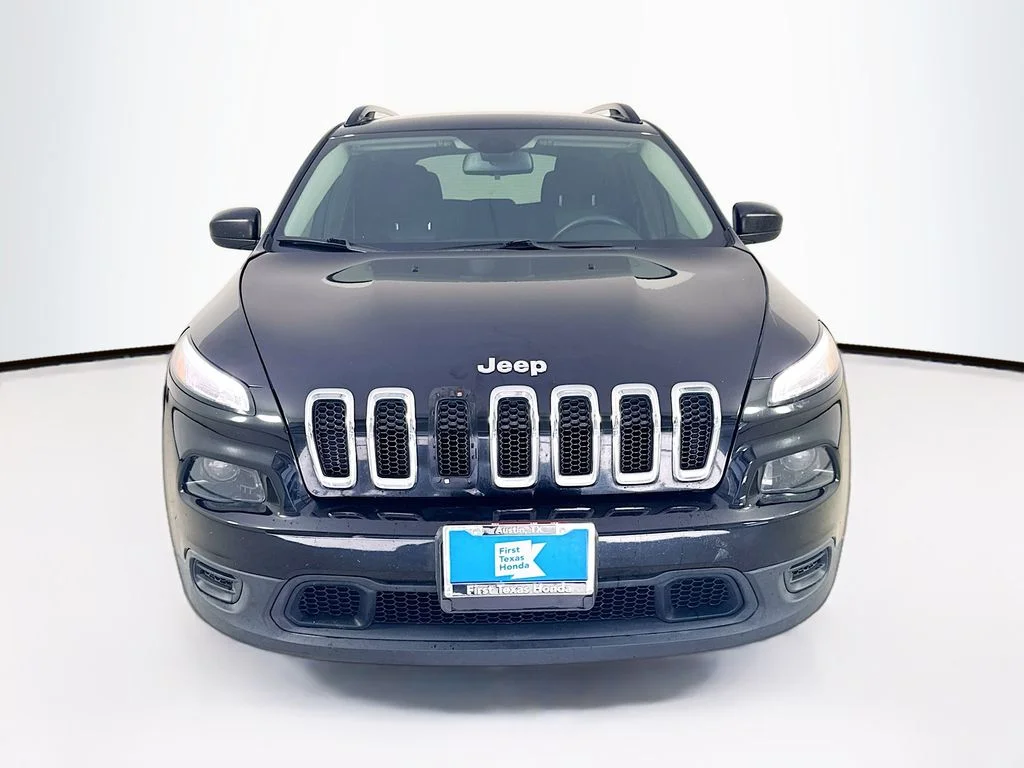 Used 2016 Brilliant Black Crystal Pearlcoat Jeep Sport image 2