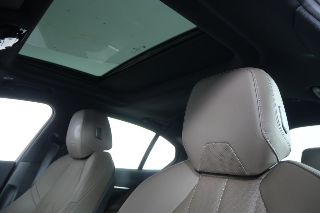 Certified Used 2024 White Metallic BMW eDrive40 image 12
