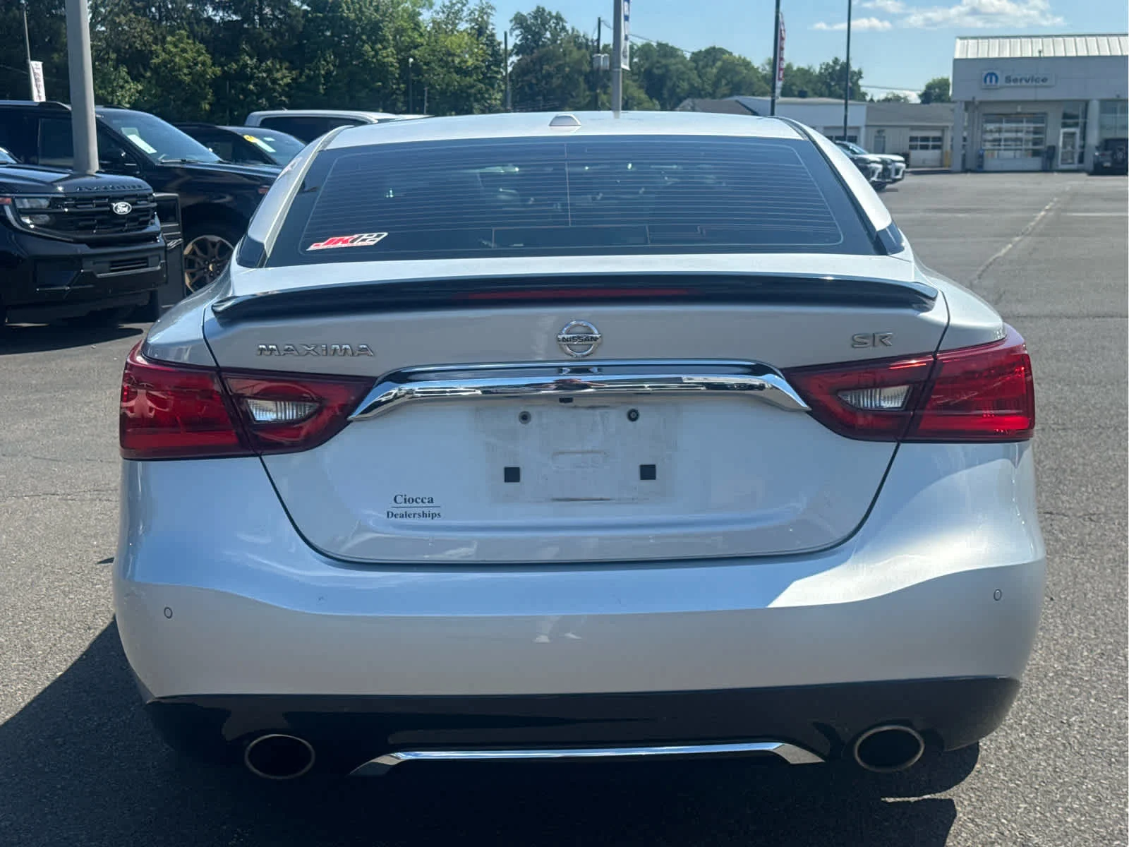 Used 2017 Brilliant Silver Nissan SR image 4