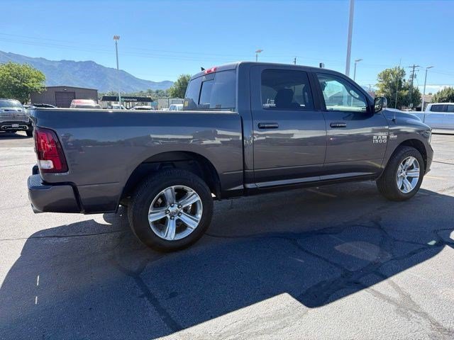 Used 2014 Granite Crystal Metallic Clearcoat Ram Sport image 4