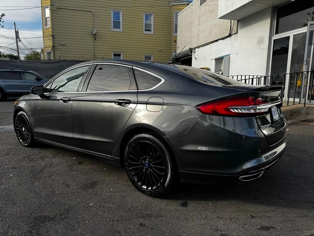 Used 2017 Ford Fusion Titanium with VIN 3FA6P0K93HR124217 for sale in Bronx, NY