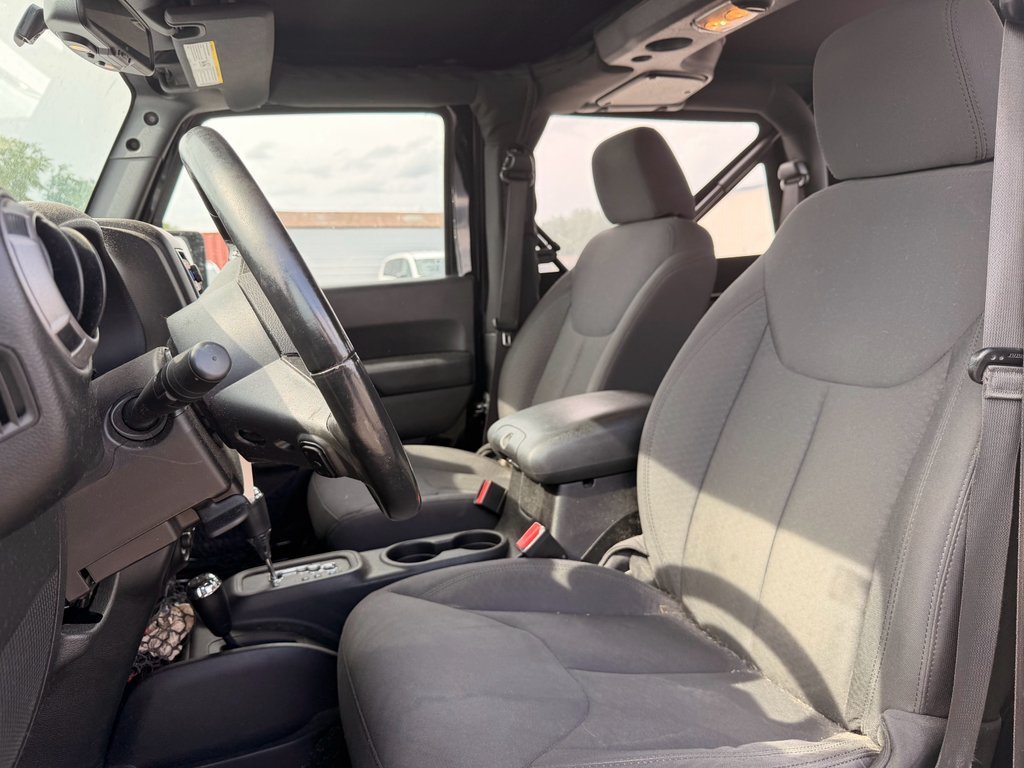 Used 2015 Black Clearcoat Jeep Sport image 5
