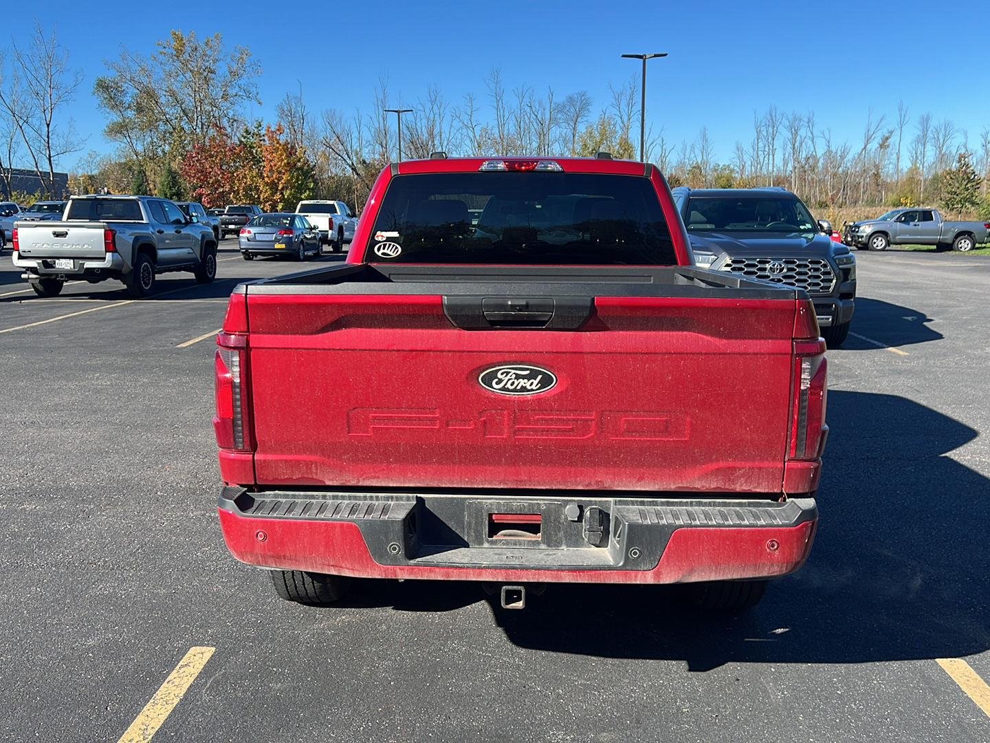 Used 2024 Rapid Red Metallic Tinted Clearcoat Ford STX image 3
