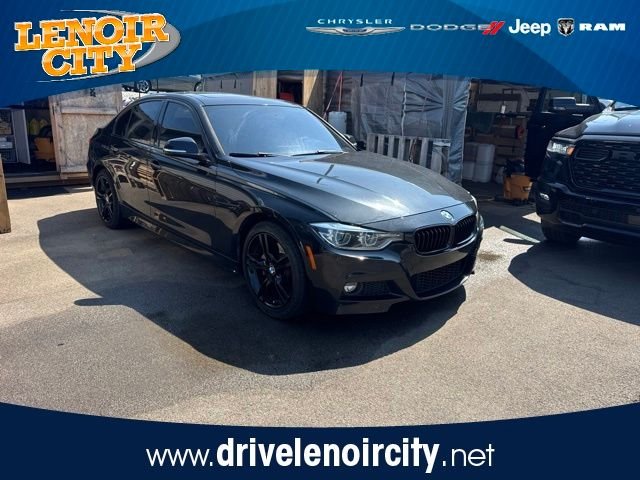 Used 2018 Black BMW 330i xDrive image 1