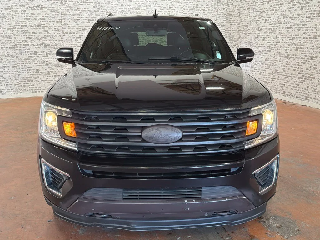 Used 2021 Agate Black Metallic Ford Limited image 2