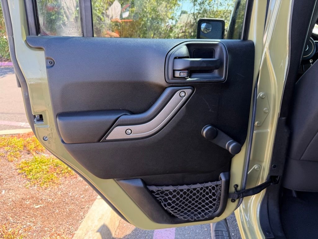 Used 2013 Commando Green Jeep Unlimited Sport image 26