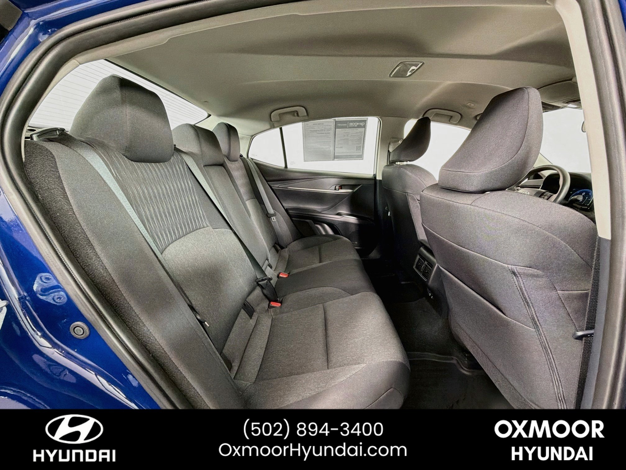 Used 2025 Reservoir Blue Toyota LE image 26