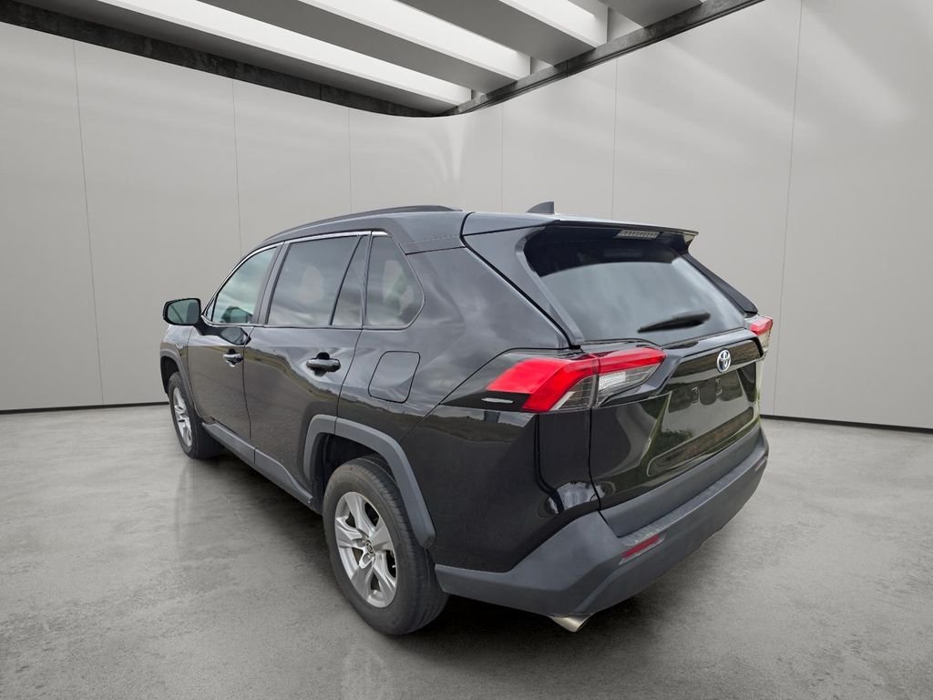 Used 2022 Midnight Black Metallic Toyota Hybrid LE image 3