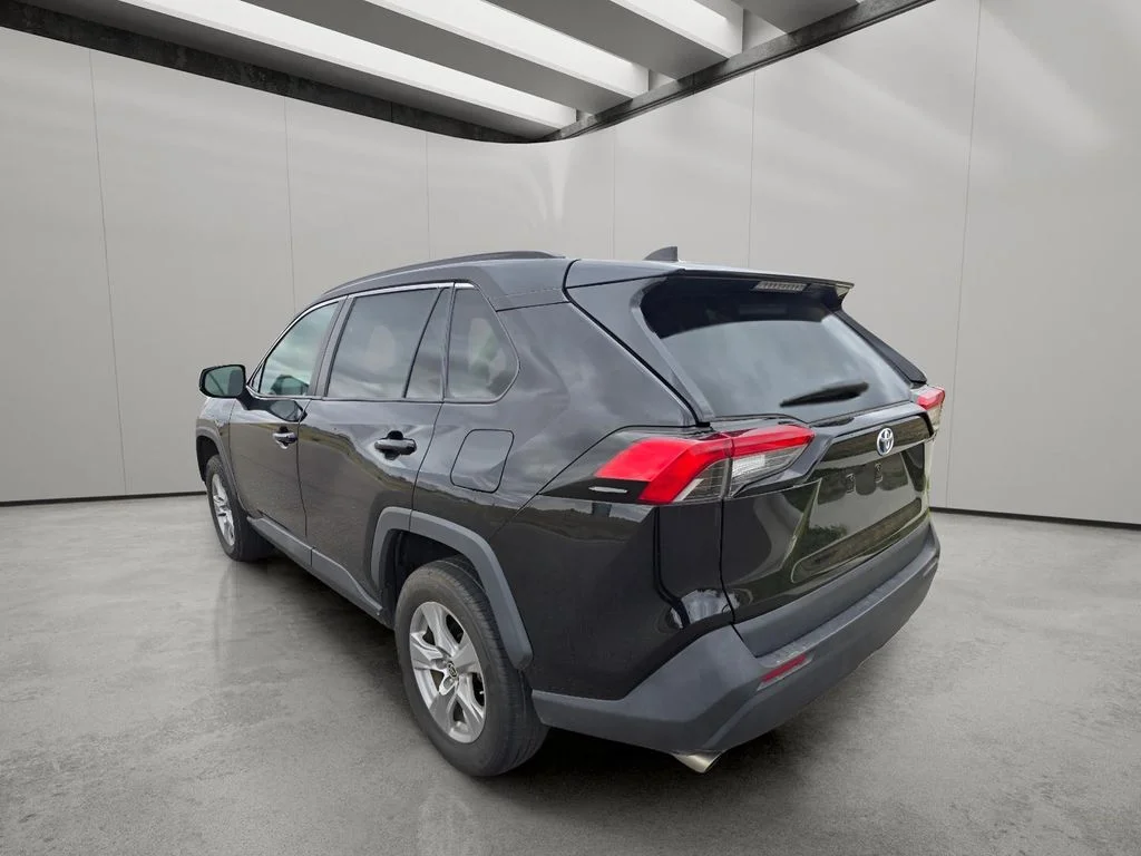 Used 2022 Midnight Black Metallic Toyota Hybrid LE image 3