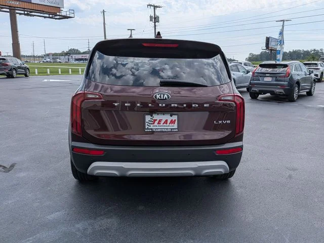 Used 2021 Purple Kia LX image 6