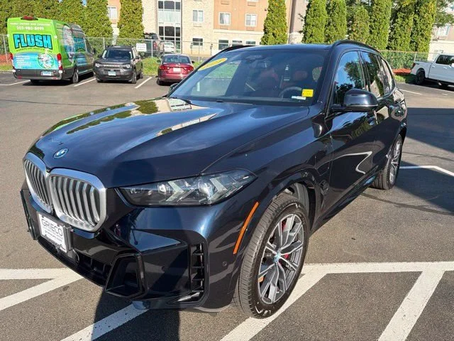 Used 2024 Carbon Black Metallic BMW xDrive50e image 7