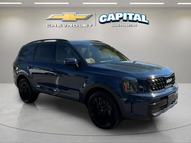 Used 2024 Blue Kia EX X-Line image 7