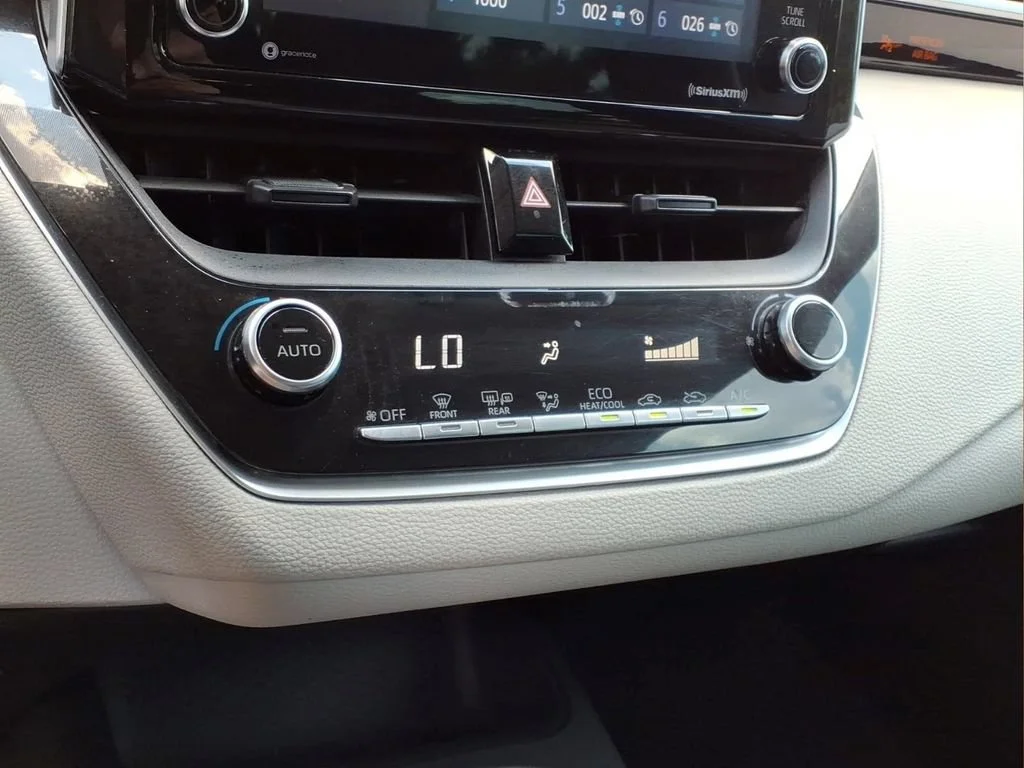Used 2021 White Toyota LE image 6