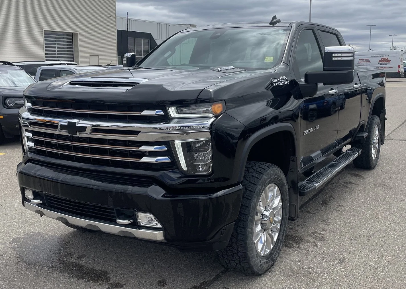 Used 2021 Black Chevrolet Crew Cab  HIGH COUNTRY image 1