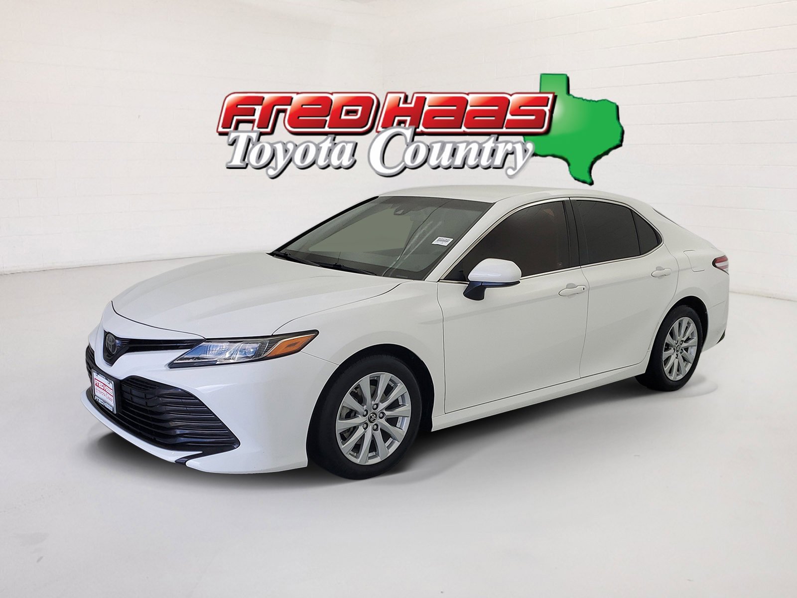 Used 2018 Super White Toyota LE image 1
