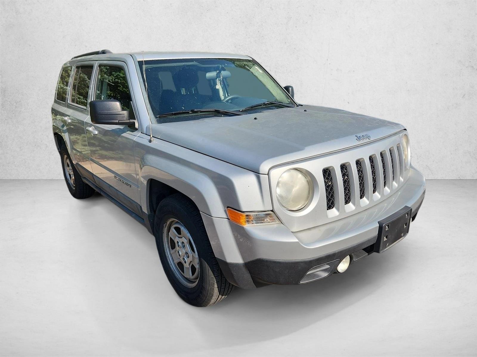 Used 2011 Bright Silver Metallic Jeep Sport image 3