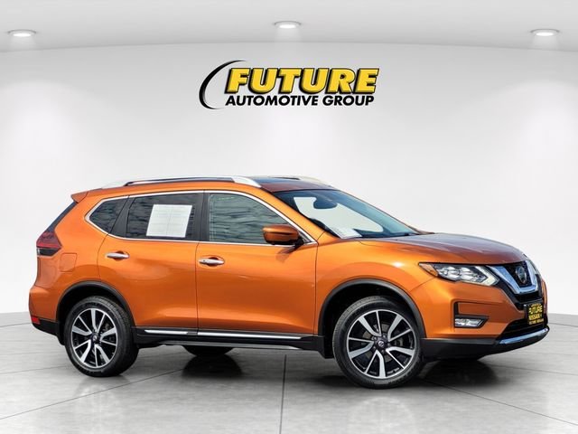 Used 2020 Orange Nissan SL image 1