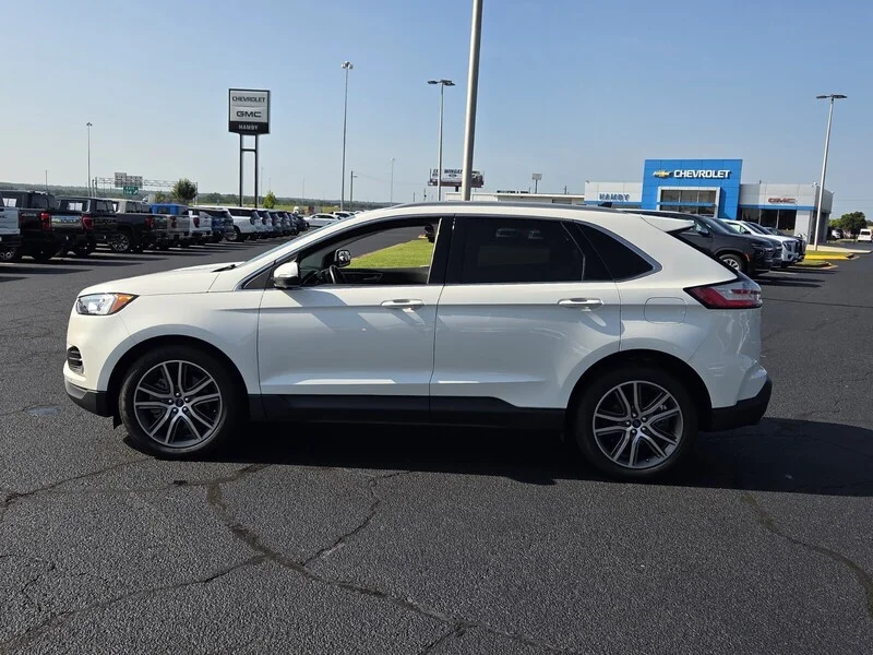 Used 2021 White Metallic FORD TITANIUM image 4