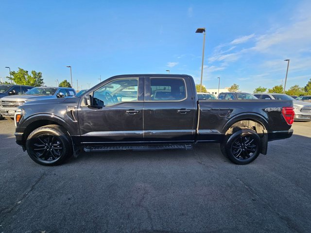 Used 2025 Agate Black Metallic Ford LARIAT image 42