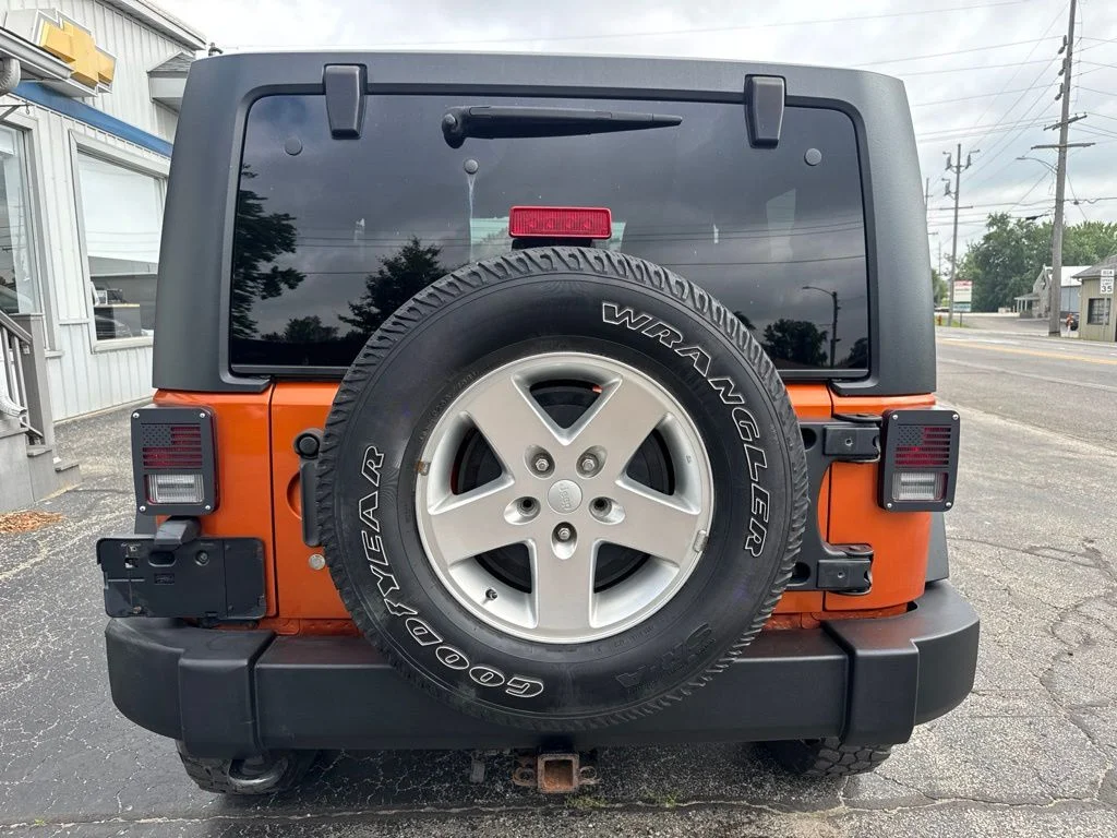 Used 2011 Orange Jeep Rubicon image 6