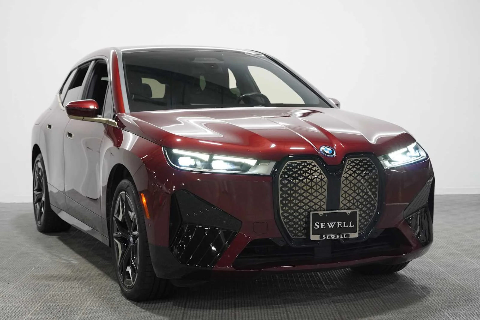 Certified Used 2024 Aventurin Red Metallic BMW xDrive50 image 3