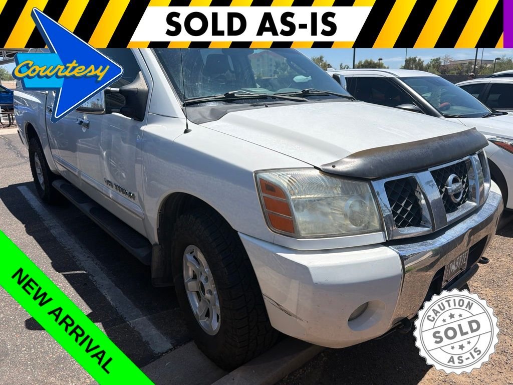 Used 2005 White Nissan LE image 1