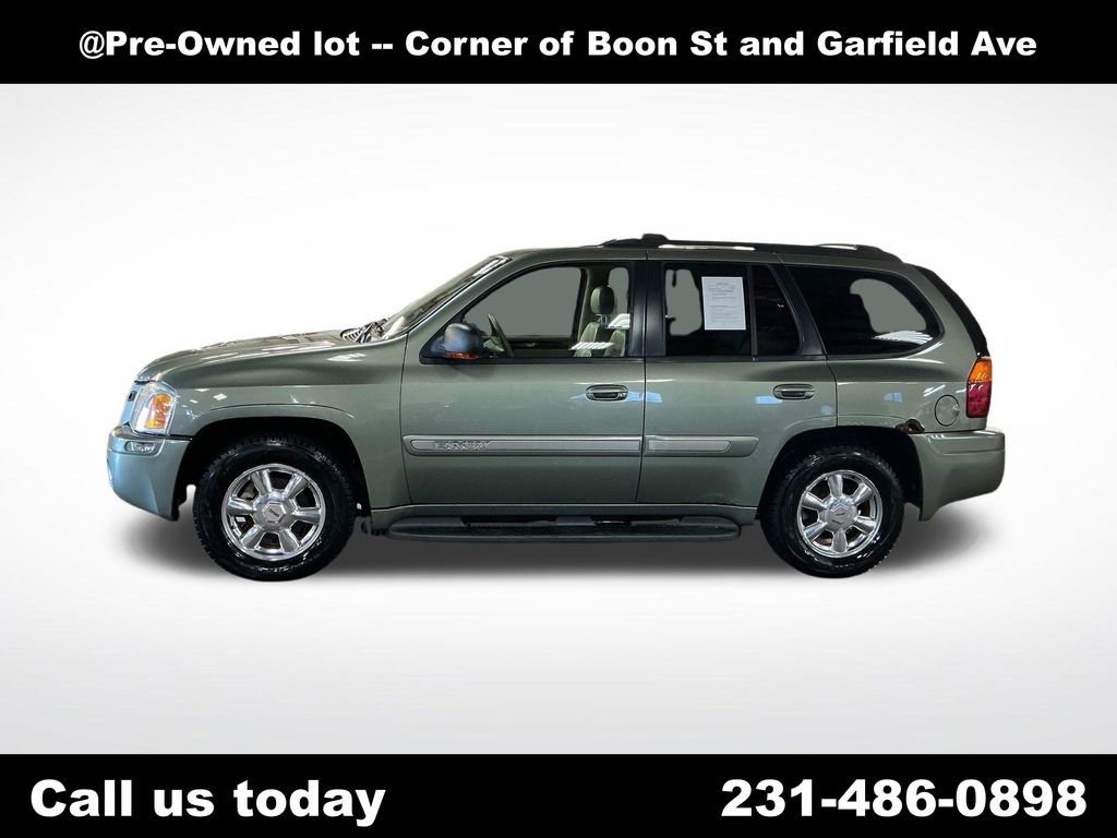 Used 2003 GMC Envoy SLT with VIN 1GKDT13S732186077 for sale in Traverse City, MI