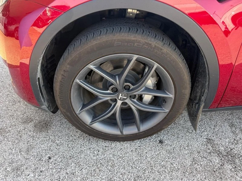 Used 2024 Tesla Model Y Long Range with VIN 7SAYGDEE8RA307635 for sale in Granite City, IL